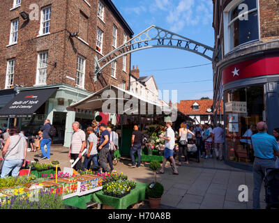 Flower market at the entrance to Shambles Market, York, England Stock Photo