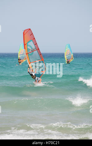 Fuerteventura, Canary Islands, North Africa, Spain: windsurfing at the beach of Playa de Sotavento, one of the most famous beaches of Costa Calma Stock Photo