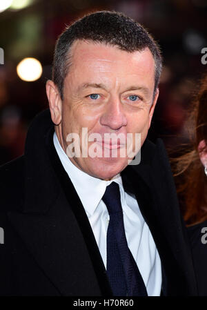 Peter Morgan attending the Crown Premiere at Odeon Cinema, Leicester Square, London. Stock Photo