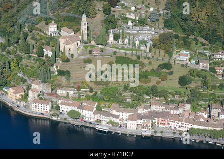 AERIAL VIEW. Picturesque lakeside town of Morcote. Lake Lugano, Canton of Ticino, Switzerland. Stock Photo