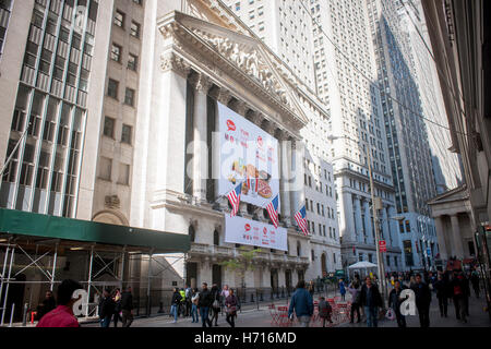 The New York Stock Exchange is decorated for the first day of trading of Yum China Holdings after its separation from Yum Brands. Yum China has exclusive rights to KFC, Pizza Hut and Taco bell in China. The company will trade under the symbol 'YUMC'.  (© Richard B. Levine) Stock Photo
