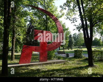 Soviet monument with hammer and sickle remain in Krasnoarmeyisk (Red army), a little city of eastern Ukraine Stock Photo