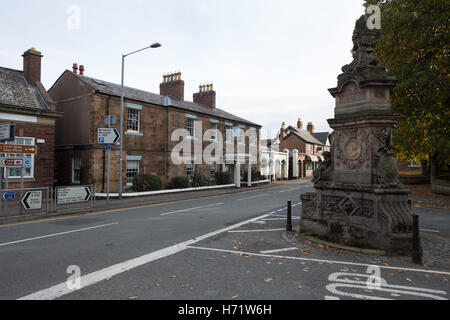 Hawarden Village in North Wales, United Kingdom showing the Glynne Arms and the Gladstone commemoration fountain Stock Photo