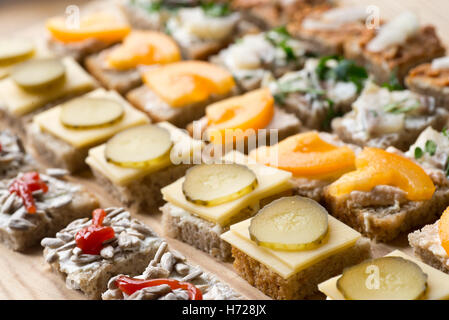 small homemade canapes variety of finger food Stock Photo