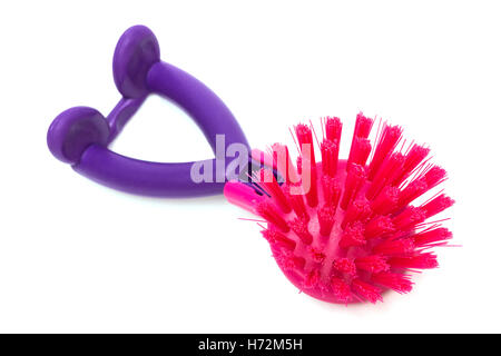 red dishwashing brush on a white background Stock Photo