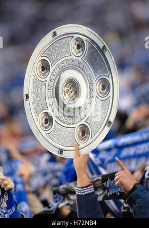 Schalke fans with Meisterschale trophy mockups, match FC Schalke 04 v VfL Wolfsburg football clubs in Gelsenkirchen Stock Photo