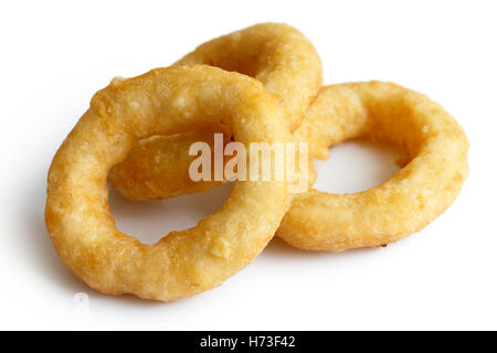 Three deep fried onion or calamari rings isolated on white. Stock Photo