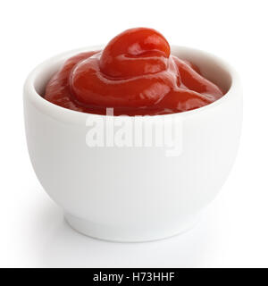 Ketchup in white ceramic ramekin. White background. Stock Photo