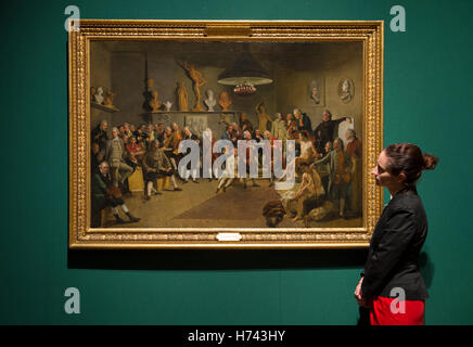 The Queen’s Gallery, Buckingham Palace, London, UK. 3rd November, 2016. Portraits by artists from Rubens and Rembrandt to Hockney and The Duke of Edinburgh go on display in new exhibition at The Queen's Gallery in an exhibition from 4 November 2016 to 17 April 2017. Photo: Johan Joseph Zoffany. The Academicians of the Royal Academy. 1771-2, with a member of Gallery staff. Credit:  artsimages/Alamy Live News. Stock Photo