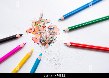 7 crayons and sharpener's peeling. Primary colors, RGB, CMYK Stock Photo