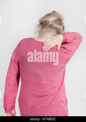 elderly woman with back pain Stock Photo
