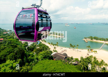 Singapore cable car in Sentosa island with aerial view of Sentosa island in Singapore. Stock Photo