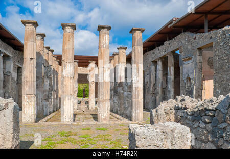 a few columns were preserved from the ancient roman temple located in Pompeii city, that was buried after Vesuvius eruption Stock Photo