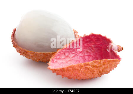 Single litchi with skin removed and flesh. On white. Stock Photo