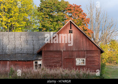 typical red wooden house in smaland near Ramkvilla south of sweden Stock Photo