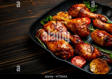 roasted chicken legs with herbs Stock Photo