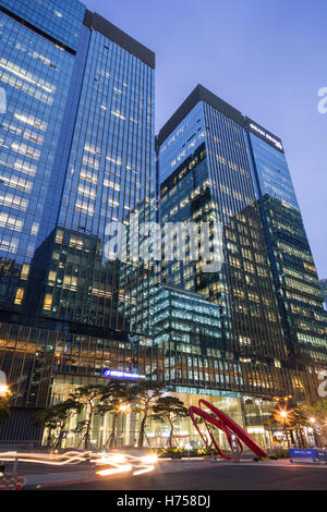 Gran Seoul Building with reflective glassy walls and reflections of another buildings on them in downtown Seoul, South Korea. Stock Photo