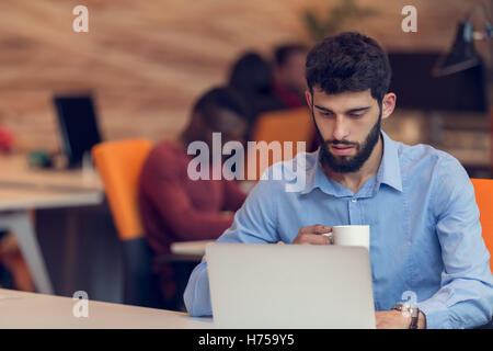 startup business, software developer working on computer at modern office Stock Photo
