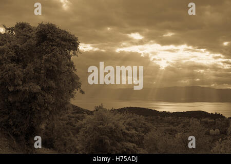 Cloudy day on a beautiful lake among the rocks and stones. Stock Photo