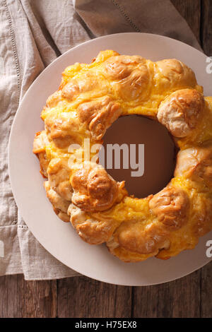 Delicious monkey bread with cheese close-up on a plate on the table. vertical view from above Stock Photo