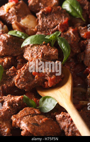 Greek food: stifado beef macro. vertical background Stock Photo