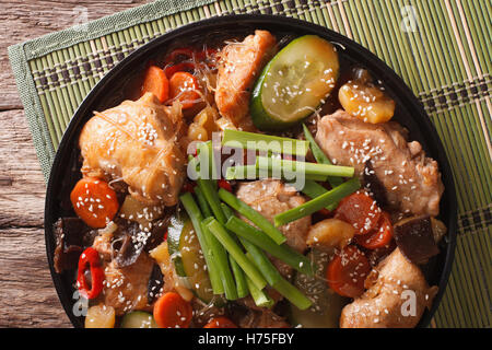 Dakjim braised chicken with vegetables in a Korean style close-up on a plate. Horizontal view from above Stock Photo