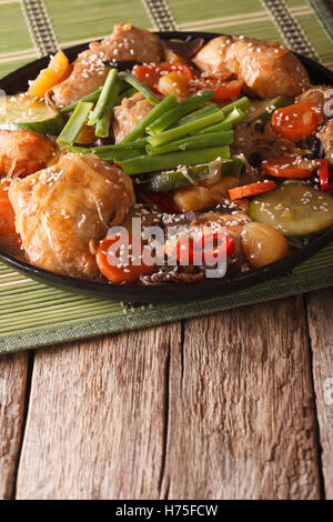 Korean food braised chicken with vegetables close-up on the table. vertical Stock Photo