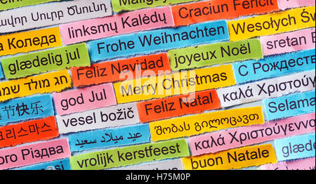 Merry Christmas  Word Cloud printed on colorful paper different languages Stock Photo