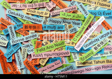 Happy New Year  Word Cloud printed on colorful paper different languages Stock Photo