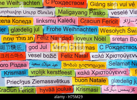 Merry Christmas  Word Cloud printed on colorful paper different languages Stock Photo