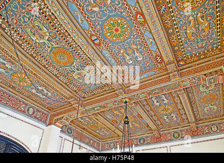 The ceiling of Taormina-Giardini Railway Station decorated with painted colorful traditional patterns on wooden panels Stock Photo