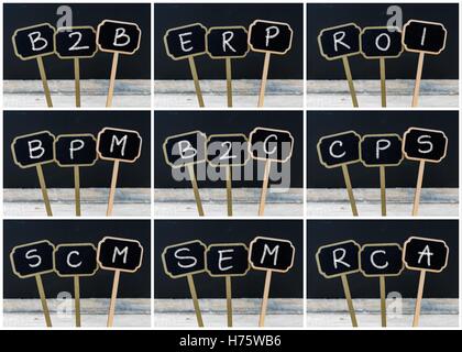 Photo collage of business acronyms written with chalk on wooden mini blackboard labels Stock Photo
