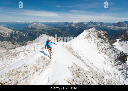 Climbing at Via Ferrata Ivano Dibona in the Dolomites, Italy. Stock Photo