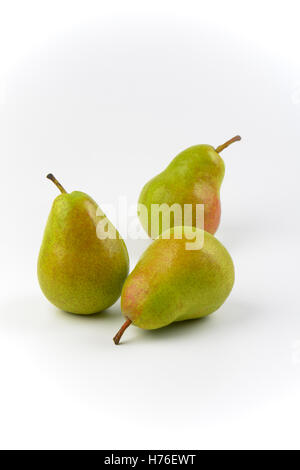 three ripe pears on white background Stock Photo