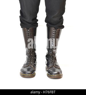 A pair of old and rugged men's/unisex knee-high black 20-eyelet lace-up combat boots Stock Photo