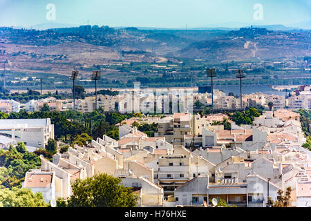 Bird's Eye View of the Shomron Mountains in the West Bank and the suburb of Kfar Saba northeast of Tel Aviv Stock Photo