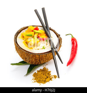 Coconut, rice and curry chicken isolated on white, close up Stock Photo