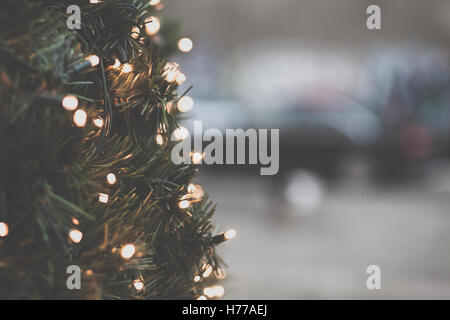 Close-up of fairy lights on a christmas tree Stock Photo
