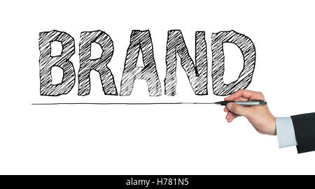 brand written by hand, hand writing on transparent board, photo Stock Photo