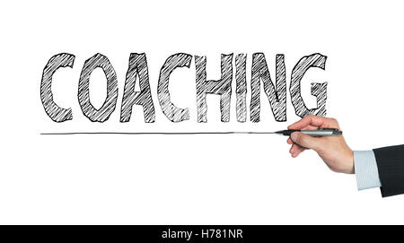 coaching written by hand, hand writing on transparent board, photo Stock Photo