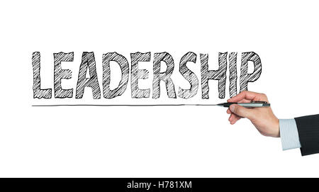 leadership written by hand, hand writing on transparent board, photo Stock Photo