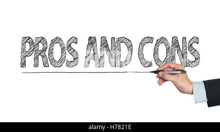 pros and cons written by hand, hand writing on transparent board, photo Stock Photo