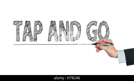 tap and go written by hand, hand writing on transparent board, photo Stock Photo