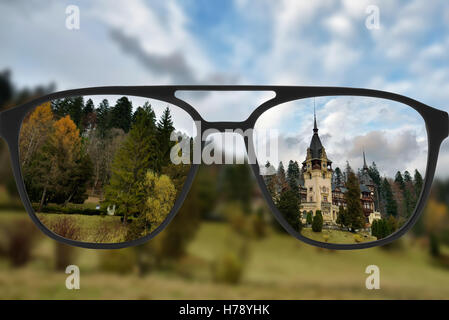 Clear image in glasses against blurry landscape Stock Photo