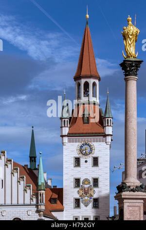 The Mariensaule is a Marian column located on the Marienplatz in Munich, Germany. It was erected in 1638 and is topped by a gold Stock Photo