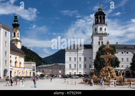 Residenzbrunnen, a grand Baroque fountain in Residenzplatz, a large, stately square in the historic center of Salzburg, Austria. Stock Photo