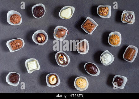 Assortment of chocolate pralines, candies and bonbons. Top view Stock Photo