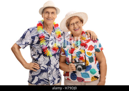 Happy mature tourists posing together and looking at the camera isolated on white background Stock Photo