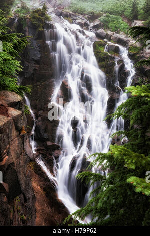 Edith Creek cascades 72 feet over Myrtle Falls and into a deep gorge at Washington’s Mt Rainier National Park. Stock Photo