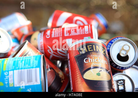 Empty cans in an overflowing recycle bin in Scotland Stock Photo